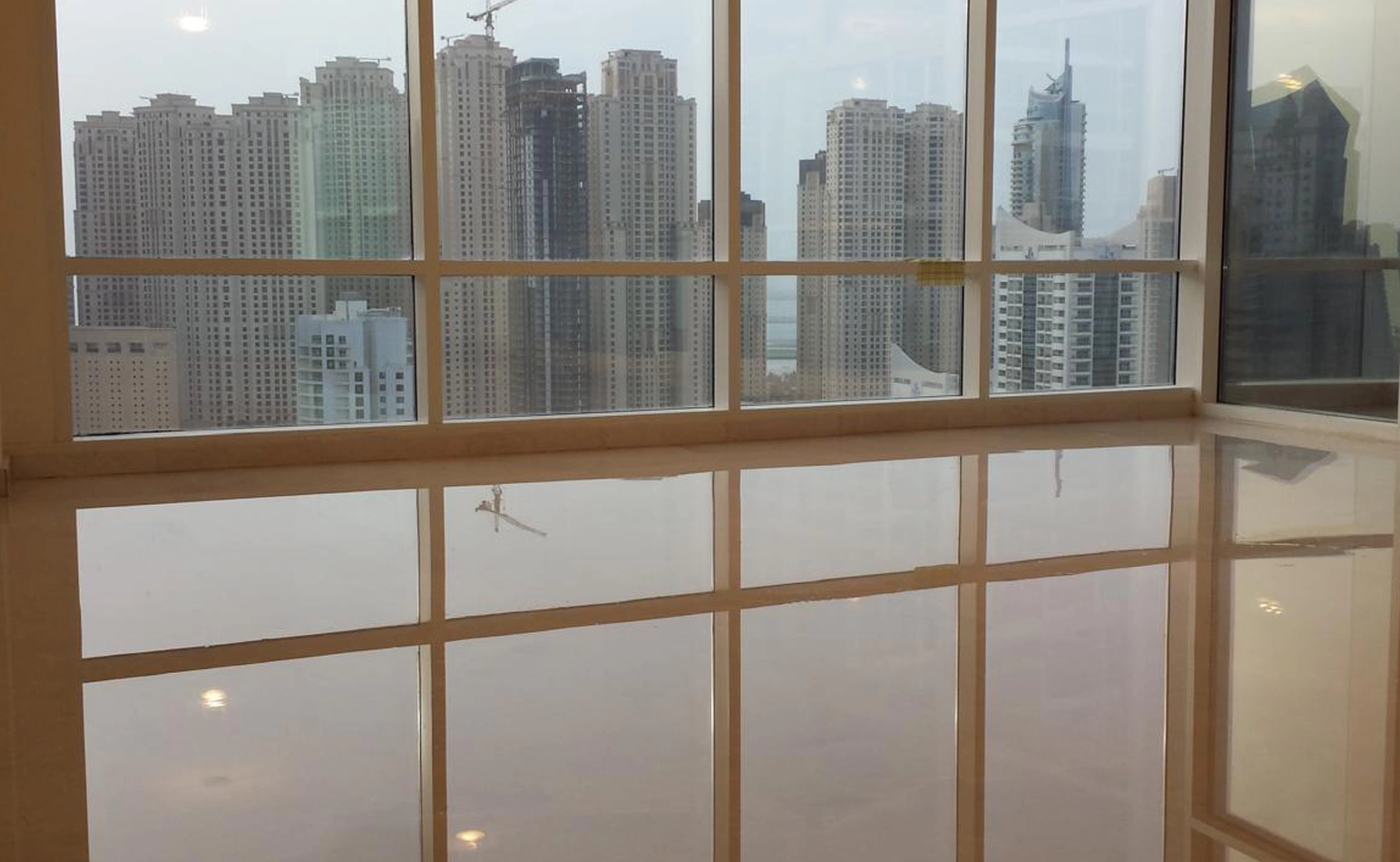 Marble tile fixing and installation works by X4 Design and Build