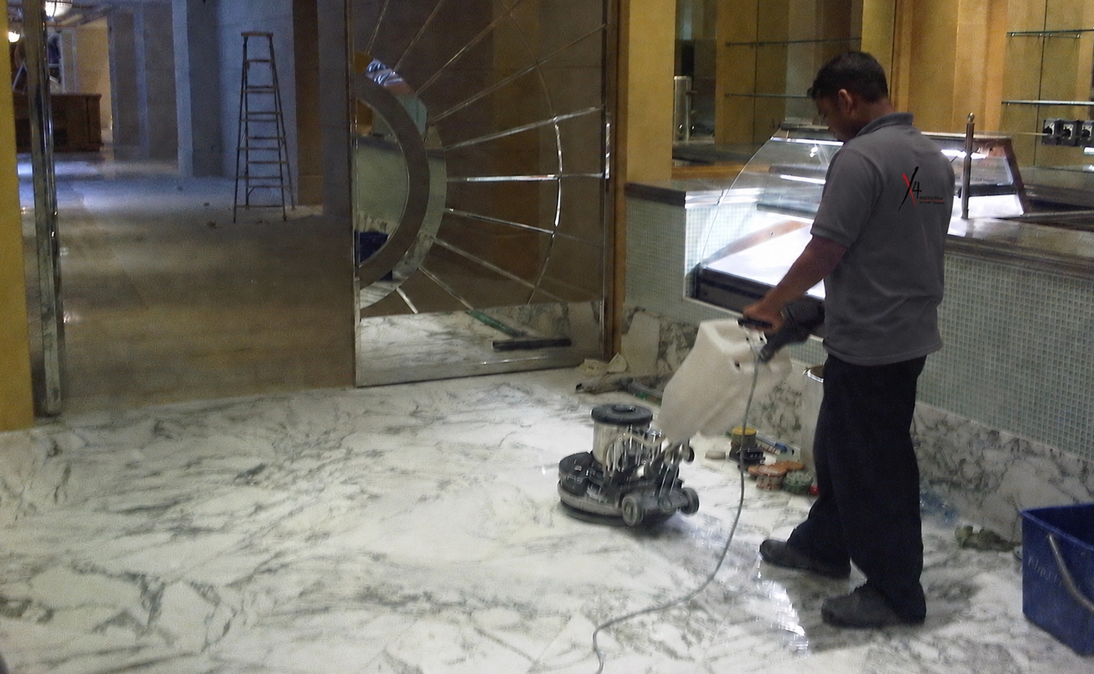 Marble tile fixing and surface preparation by X4 Design and Build